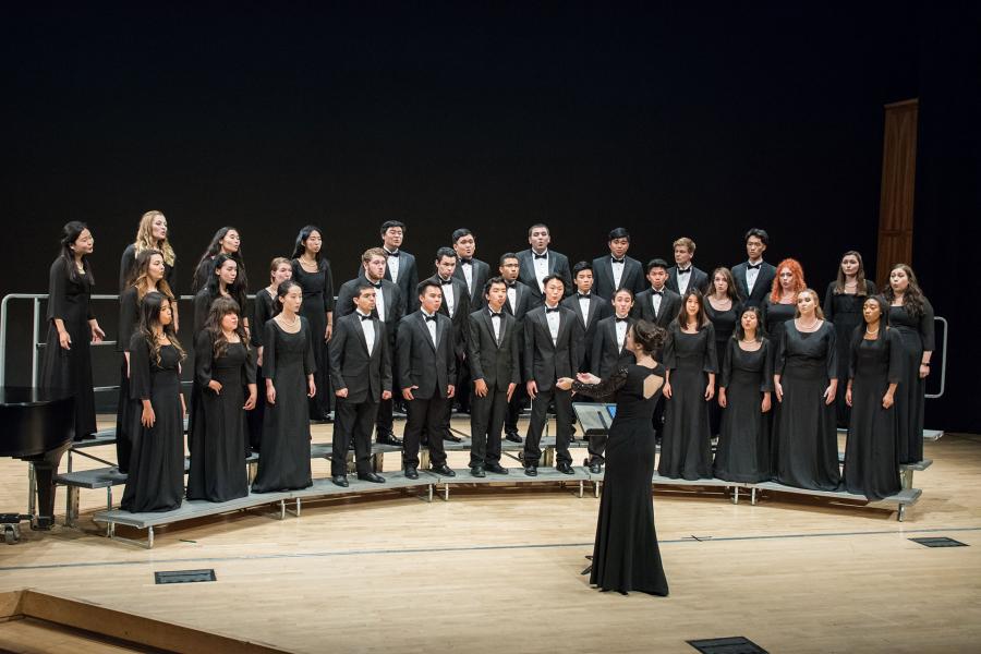 UCI choral students sing in Winifred Smith Hall